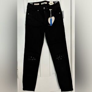 New black skinny jeans with jeweled knees.